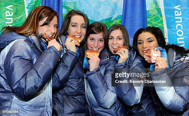 Team USA celebrates receiving the bronze medal during the medal ceremony for the ladies' 3000 m relay short track on day 14 of the Vancouver 2010...