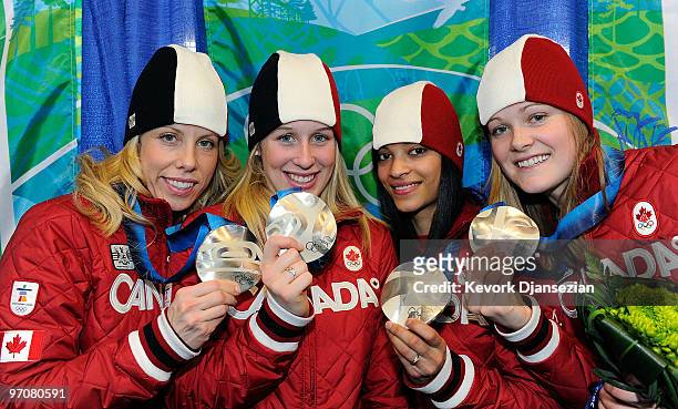 Team Canada celebrates receiving the silver medal during the medal ceremony for the ladies' 3000 m relay short track on day 14 of the Vancouver 2010...