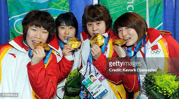 Team China celebrates receiving the gold medal during the medal ceremony for the ladies' 3000 m relay short track on day 14 of the Vancouver 2010...