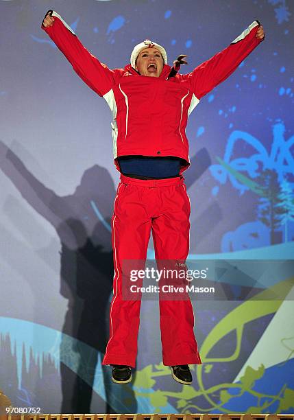 Elisabeth Goergl of Austria celebrates receiving the bronze medal during the medal ceremony for the women's giant slalom alpine skiing on day 14 of...