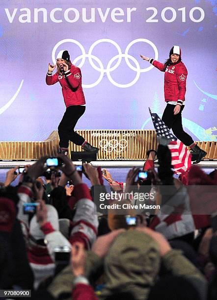 Heather Moyse of Canada receives the gold medal and Helen Upperton of Canada receives the silver medal during the medal ceremony for the women's...