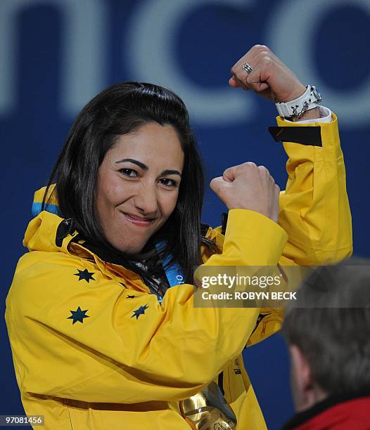 Australia's gold medalist Lydia Lassila attends the medal ceremony for the women's Freestyle Skiing Aerials event at BC Place during the Vancouver...