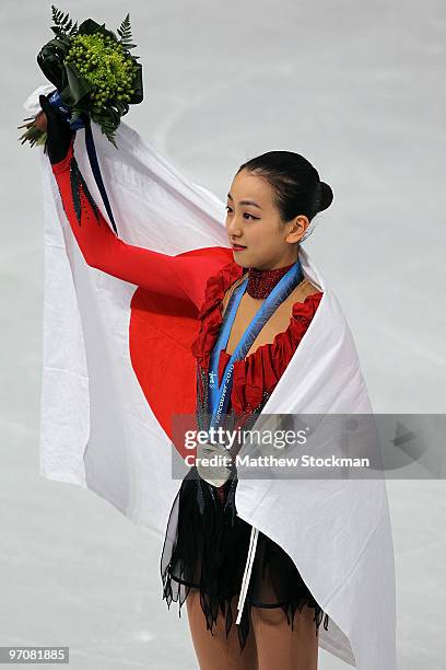 Mao Asada of Japan receives the silver medal during the medal ceremony for the Ladies Free Skating on day 14 of the 2010 Vancouver Winter Olympics at...