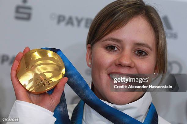 Viktoria Rebensburg of Germany poses with the gold medal for the women's giant slalom alpine skiing on day 14 of the Vancouver 2010 Winter Olympics...