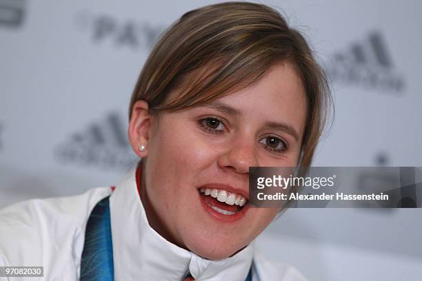 Viktoria Rebensburg of Germany smiles at a press conference after winning the gold medal for the women's giant slalom alpine skiing on day 14 of the...