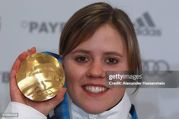 Viktoria Rebensburg of Germany poses with the gold medal for the women's giant slalom alpine skiing on day 14 of the Vancouver 2010 Winter Olympics...