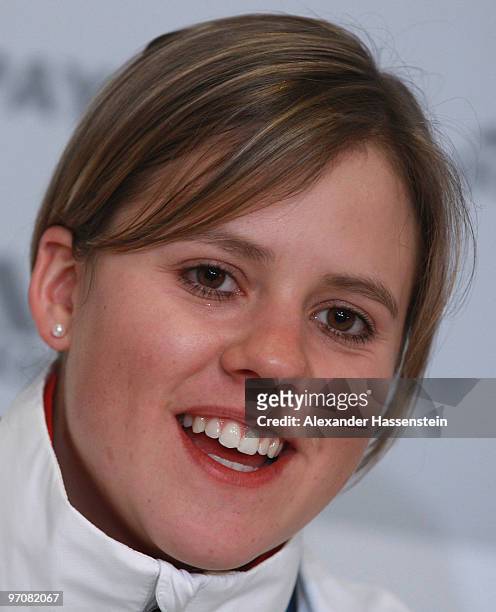 Viktoria Rebensburg of Germany smiles at a press conference after winning the gold medal for the women's giant slalom alpine skiing on day 14 of the...