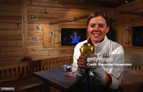 Viktoria Rebensburg of Germany poses with the gold medal for the women's giant slalom alpine skiing on day 14 of the Vancouver 2010 Winter Olympics...