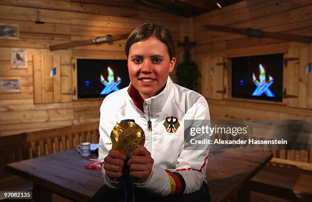 Viktoria Rebensburg of Germany poses with the gold medal for the women's giant slalom alpine skiing on day 14 of the Vancouver 2010 Winter Olympics...