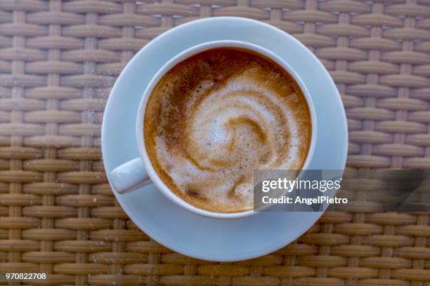 a cup of coffe with milk - miguelangelortega stock pictures, royalty-free photos & images