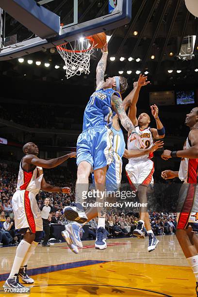 Chris Andersen of the Denver Nuggets rises up for the put-back against the Golden State Warriors on February 25, 2010 at Oracle Arena in Oakland,...