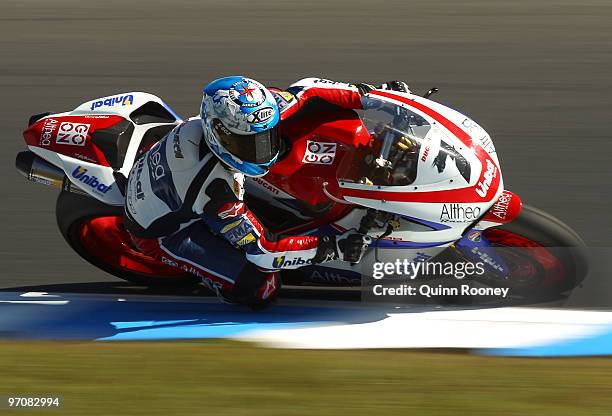 Carlos Checa of Spain and the Althea Racing Team rounds the bend during practice ahead of round one for the Superbike World Championship at Phillip...