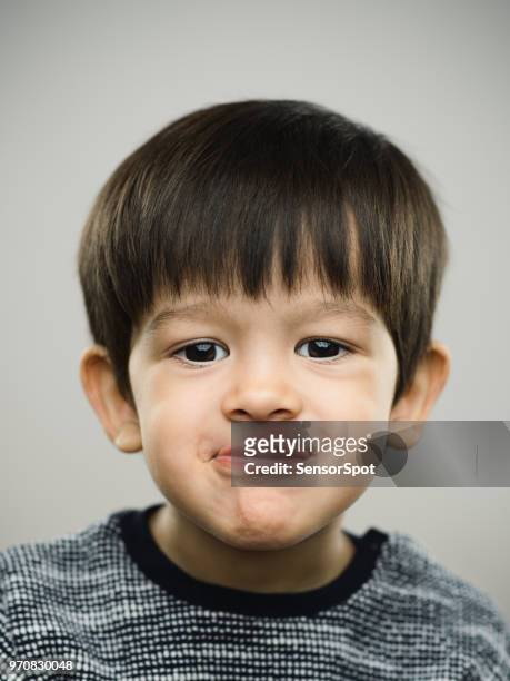 real kid making a face - kid middle finger imagens e fotografias de stock