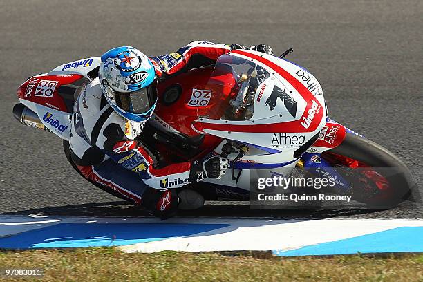 Carlos Checa of Spain and the Althea Racing Team rounds the bend during practice ahead of round one for the Superbike World Championship at Phillip...