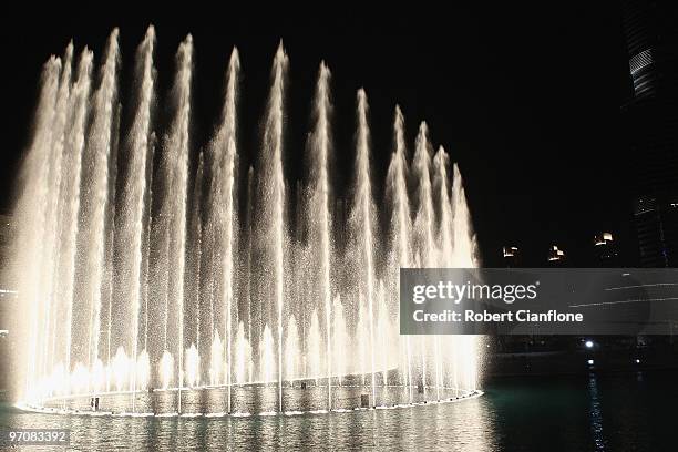 Water jets spray out of the The Dubai Fountain on February 25, 2010 in Dubai, United Arab Emirates. Set on the 30-acre Burj Dubai Lake, the fountain...