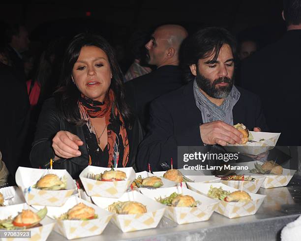 Rachael Ray and her husband John Cusimano attend Rachael Ray's Burger Bash Hosted by Amstel Light at Ritz Carlton South Beach on February 25, 2010 in...