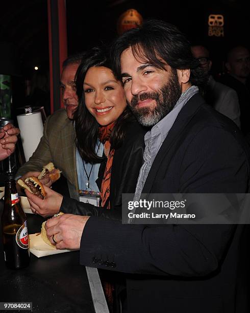 Rachael Ray and her husband John Cusimano attend Rachael Ray's Burger Bash Hosted by Amstel Light at Ritz Carlton South Beach on February 25, 2010 in...