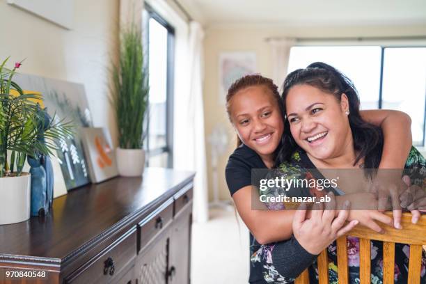 mother and daughter bonding. - pacific islander stock pictures, royalty-free photos & images