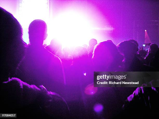 crowd at a rave - illuminated stock pictures, royalty-free photos & images