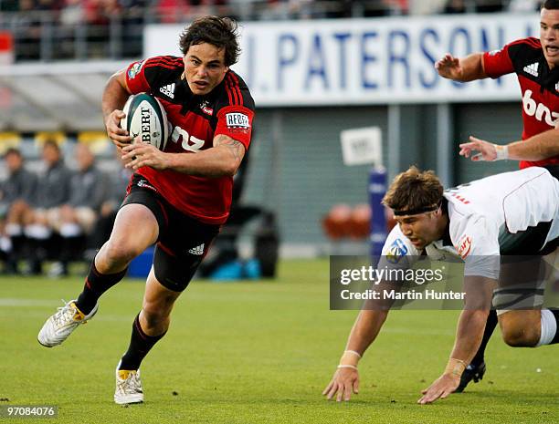 Zac Guilford of the Crusaders runs in to score during the round three Super 14 match between the Crusaders and the Sharks at AMI Stadium on February...