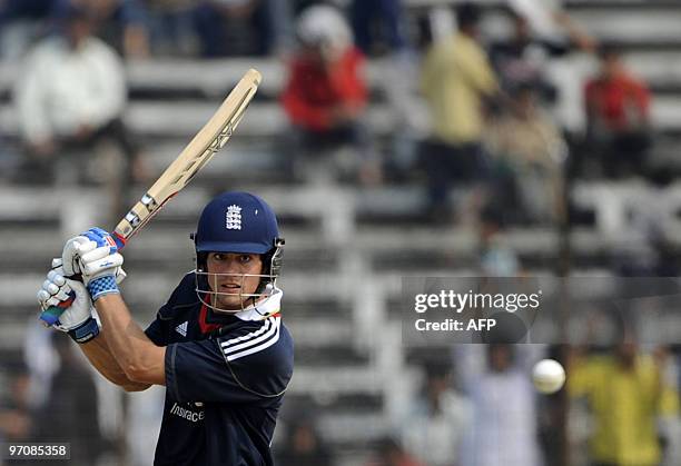 England cricket team captain Alastair Cook watches the ball after playing a shot during a practice match between a Bangladesh Cricket Board XI and...