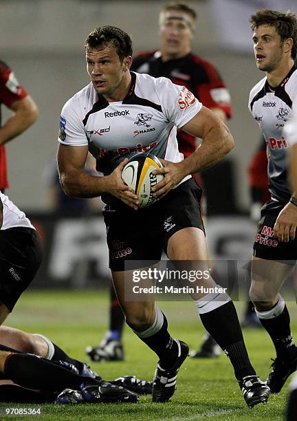 Bismarck du Plessis of the Sharks runs with the ball during the round three Super 14 match between the Crusaders and the Sharks at AMI Stadium on...