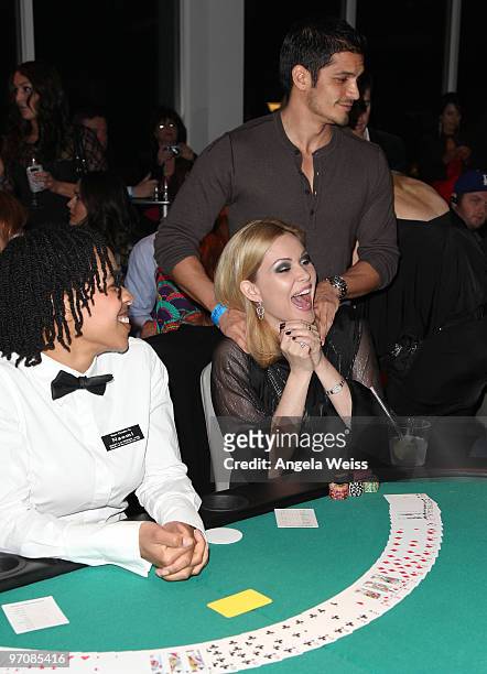 Actors Nicholas Gonzalez and Shanna Moakler participate in the 'Get Lucky for Lupus' celebrity charity poker tournament at Andaz West Hollywood on...