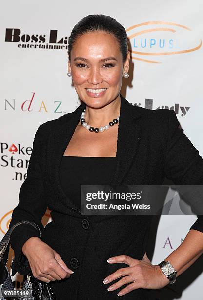 Actress Tia Carrere arrives at the 'Get Lucky for Lupus' celebrity charity poker tournament at Andaz West Hollywood on February 25, 2010 in West...