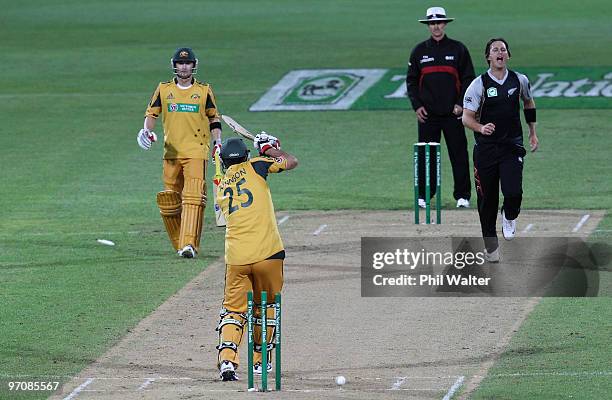 Mitchell Johnson of Australia is bowled by Shane Bond of New Zealand during the Twenty20 international match between New Zealand and Australia at...