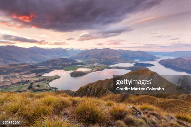 epic landscape at sunset from mt roy, wanaka, new zealand - new zealand southern alps stock pictures, royalty-free photos & images