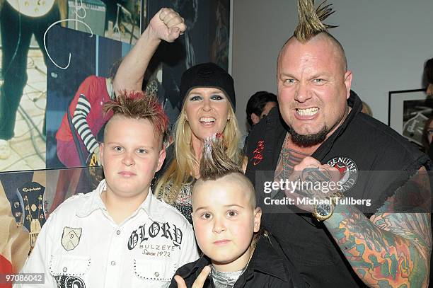 Singer/guitarist Lita Ford of The Runaways poses with husband Jim Gilette and sons James and Rocco at the Rock 'N' Roll Fantasy Camp 2010 acoustic...