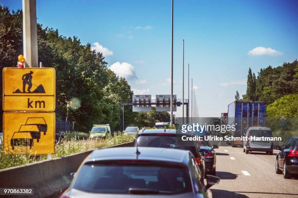 traffic jam in holiday season on motorway - traffic jam stock pictures, royalty-free photos & images