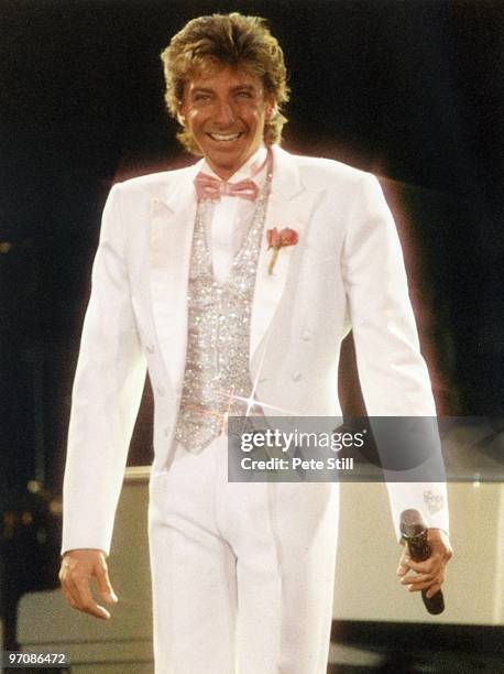 Barry Manilow performs on stage at Wembley Arena on January 4th, 1986 in London, England.