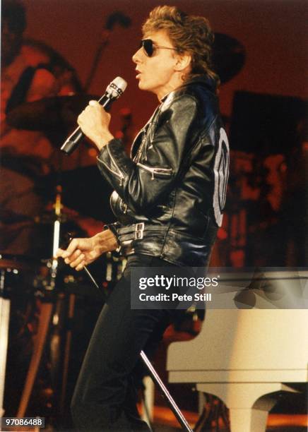 Barry Manilow performs on stage at Wembley Arena on January 4th, 1986 in London, England.