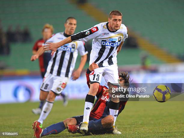 Andrea Coda of Udinese competes with Anderson Miguel Da Silva Nene' of Cagliari during the Serie A match between Udinese Calcio and Cagliari Calcio...