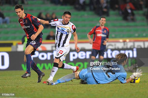 Goalkeeper of Cagliari Federico Marchetti and Mauricio Anibal Isla of Udinese Davide Astori of Cagliari during the Serie A match between Udinese...