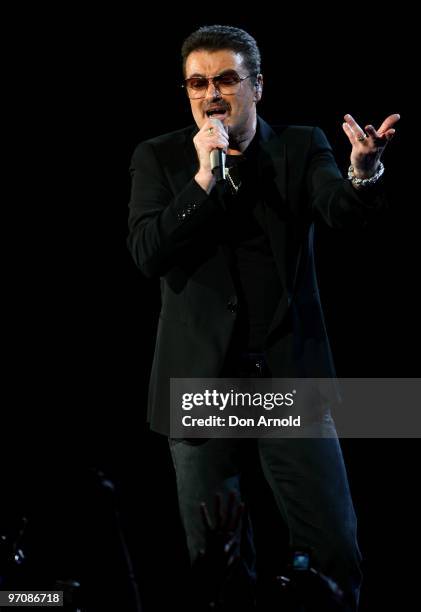 George Michael performs on stage on the Sydney Football Stadium on February 26, 2010 in Sydney, Australia.