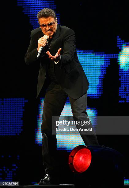 George Michael performs on stage on the Sydney Football Stadium on February 26, 2010 in Sydney, Australia.