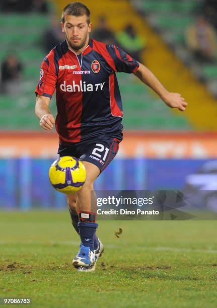 Michele Canini of Cagliari in action during the Serie A match between Udinese Calcio and Cagliari Calcio at Stadio Friuli on February 24, 2010 in...