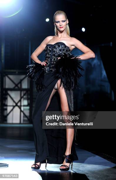 Model Carmen Kass walks the runway during the DSquared2 Milan Fashion Week Autumn/Winter 2010 show on February 26, 2010 in Milan, Italy.