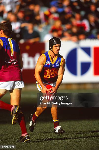 Shaun Hart of the Lions kicks during the round 15 AFL match between Collingwood and Brisbane at the MCG in Melbourne, Australia.