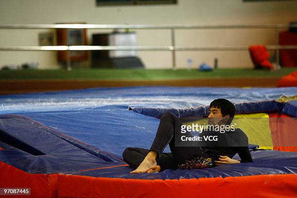 Chinese hurdler Liu Xiang rests during National Indoor Athletics Championships on February 26, 2010 in Shanghai of China. It is the warm-up match for...