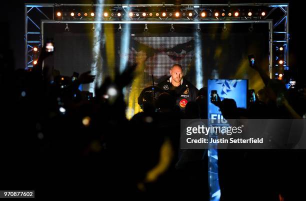 Tyson Fury makes his way to the ring prior to fighting Sefer Seferi before there heavyweight contest at Manchester Arena on June 9, 2018 in...