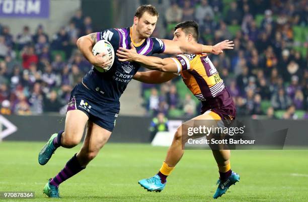 Cheyse Blair of the Melbourne Storm runs with the ball during the round 14 NRL match between the Melbourne Storm and the Brisbane Broncos at AAMI...