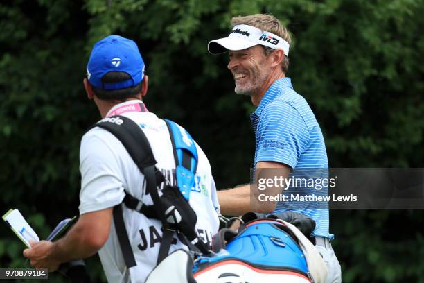 Raphael Jacquelin of France looks on with his caddy during day four of The 2018 Shot Clock Masters at Diamond Country Club on June 10, 2018 in...