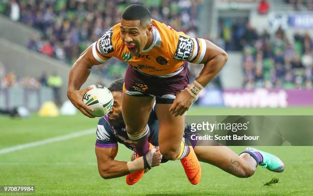 Jamayne Isaako of the Broncos scores a try during the round 14 NRL match between the Melbourne Storm and the Brisbane Broncos at AAMI Park on June...