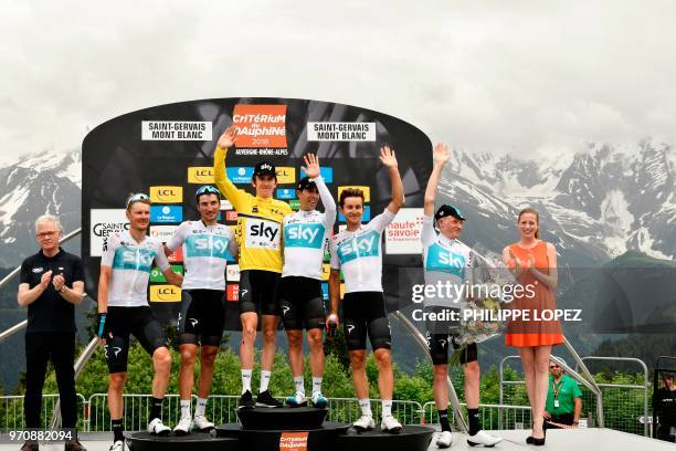 Overall race winner Britain's Geraint Thomas , wearing the overall leader's yellow jersey, and his Great Britain's Sky cycling team Netherlands'...