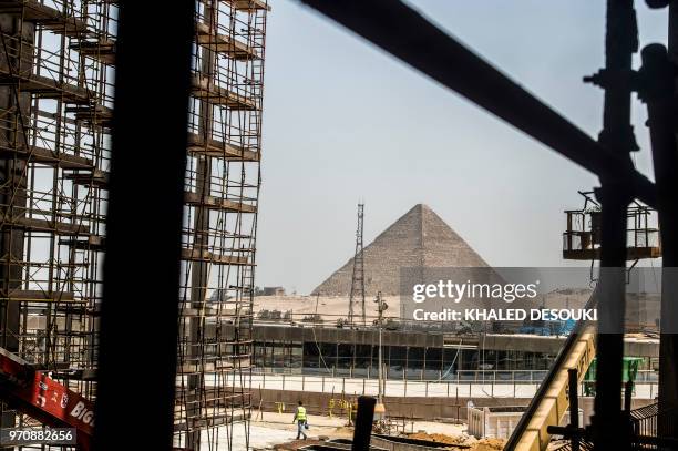 Picture taken on June 10, 2018 shows a view of construction work undergoing at the site of the Grand Egyptian Museum in Giza on the southwestern...