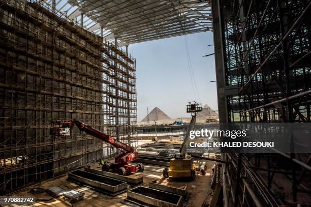Picture taken on June 10, 2018 shows a view of construction work undergoing at the site of the Grand Egyptian Museum in Giza on the southwestern...
