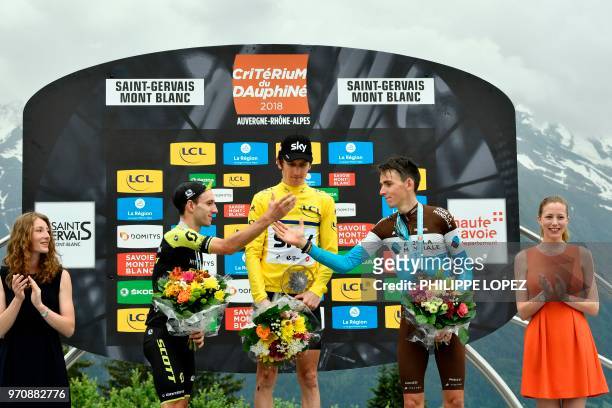 Race winner Britain's Geraint Thomas, wearing the overall leader's yellow jersey , stage winner and overall second-placed Great Britain's Adam Yates...